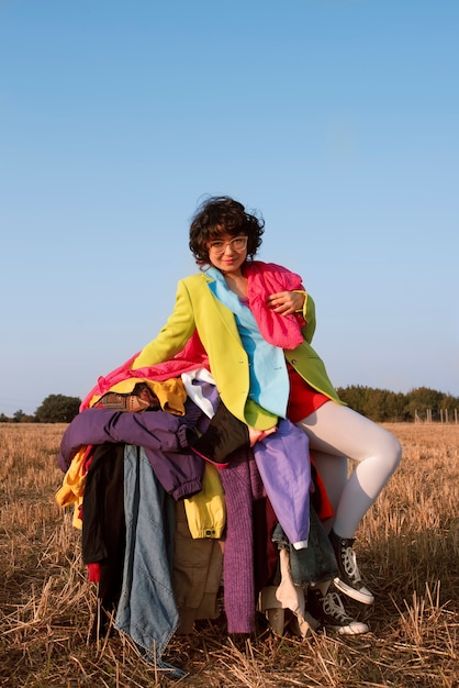 Full shot woman posing fast fashion concept