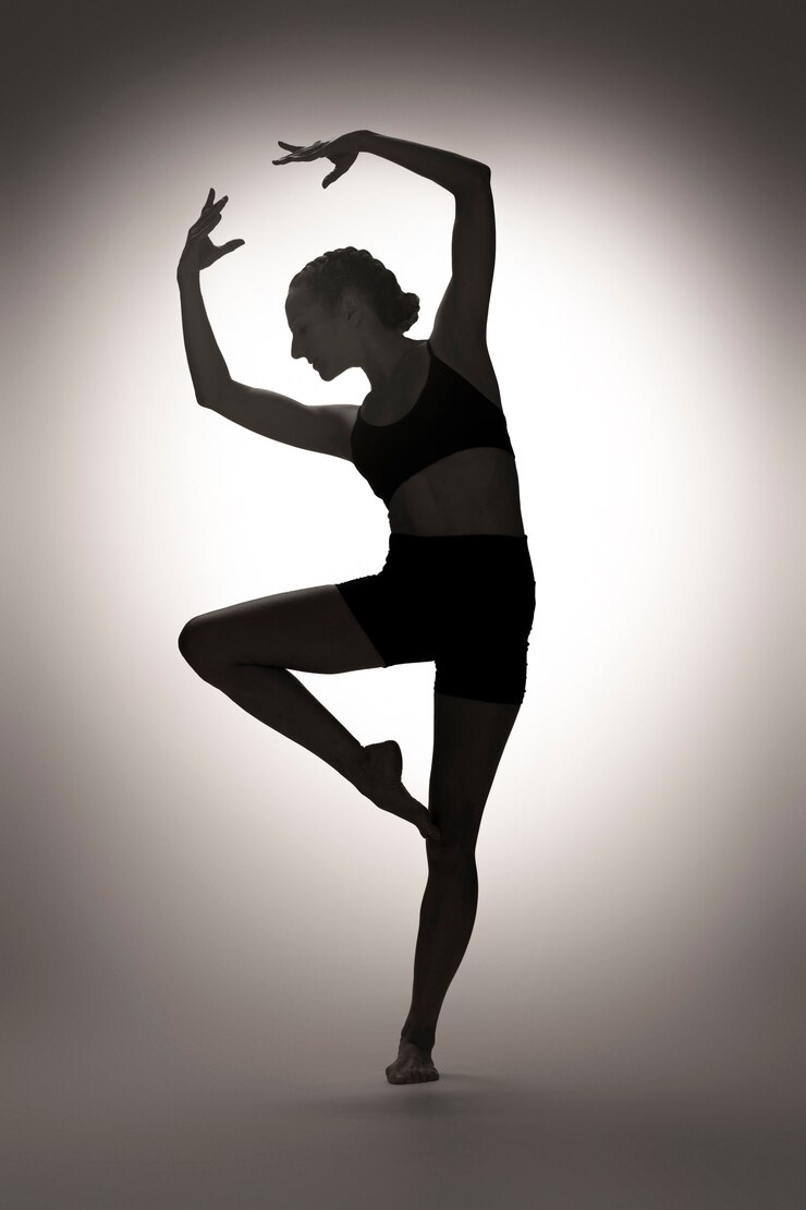 Free Photo full shot woman posing with bright light