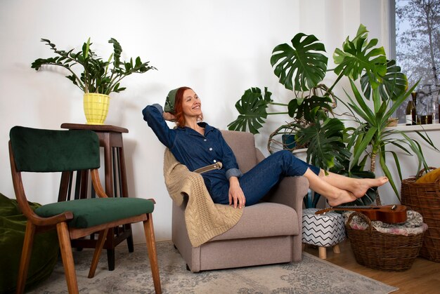 Full shot woman restoring furniture