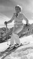 Free photo full shot woman skiing monochrome