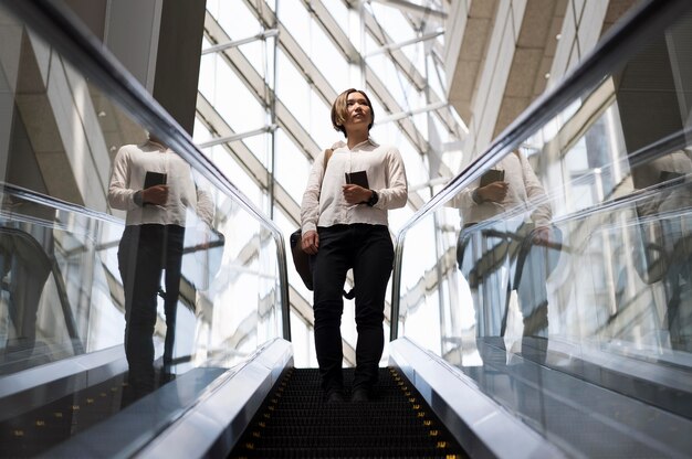 Full shot woman on stairs