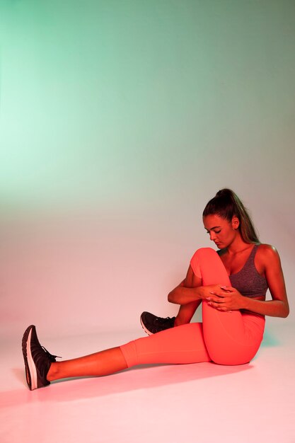 Full shot of woman stretching