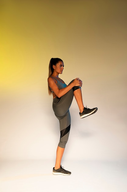 Full shot of woman stretching