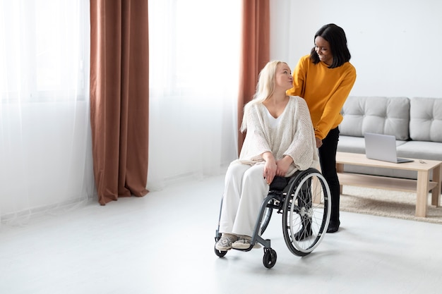 Full shot woman in wheelchair