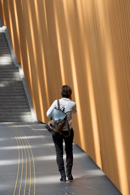 Full shot woman with backpack