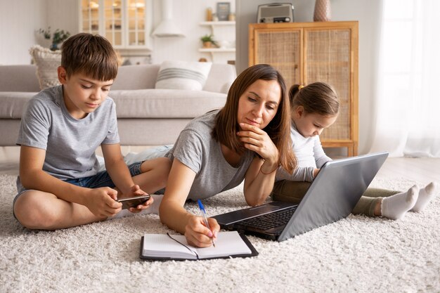 Full shot woman working from home