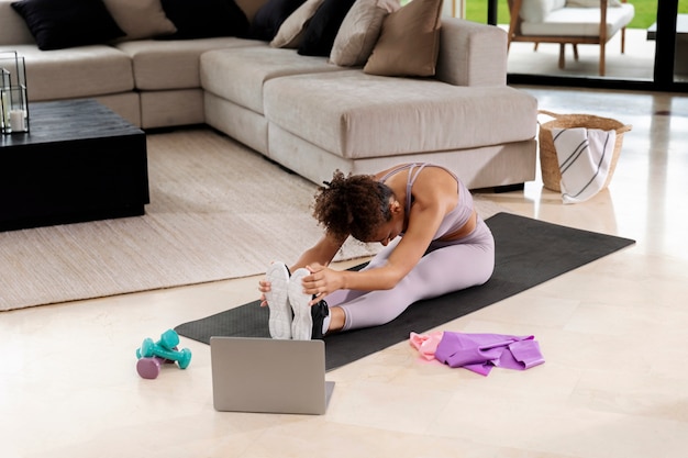 Free Photo  Handsome man doing abs exercises at home. concept of healthy  life.