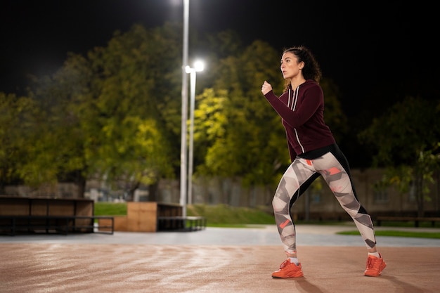 Full shot woman working out