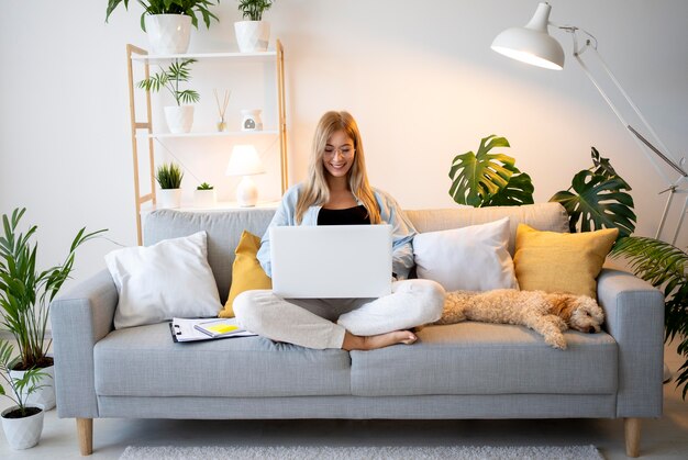 Full shot woman working with dog