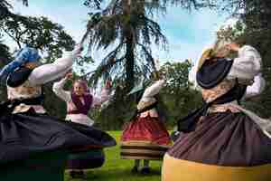 Free photo full shot women dancing folk