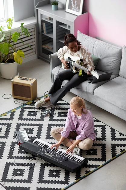 Full shot women playing instruments