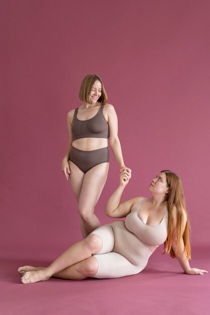 Full shot women posing together