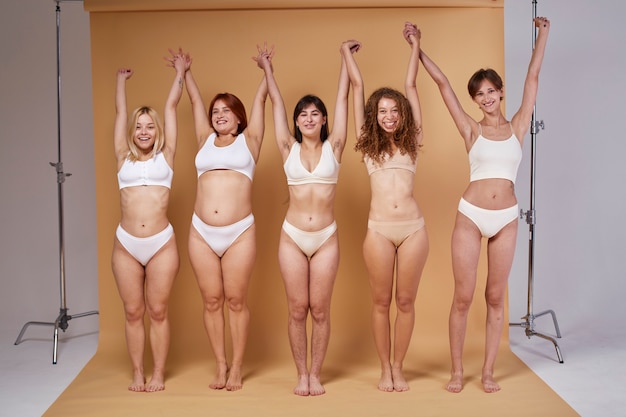 Full shot women with different bodies