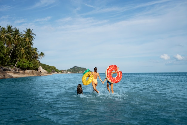 Full shot women with floaters