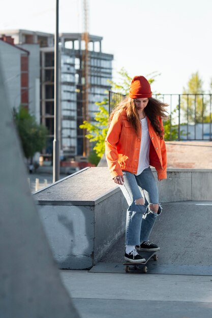 Full shot young girl skating