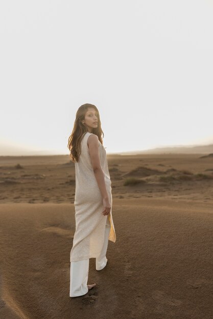 Full shot young woman in desert