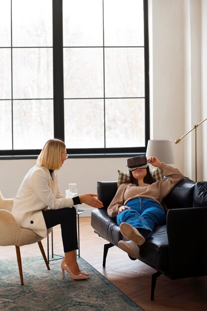 Full shot young woman undergoing therapy