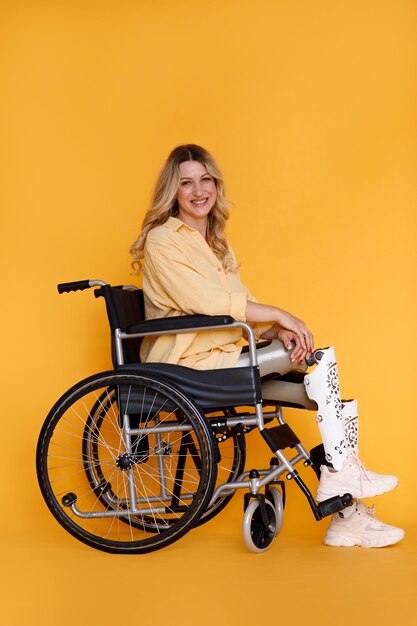 Full shot young woman with prosthesis