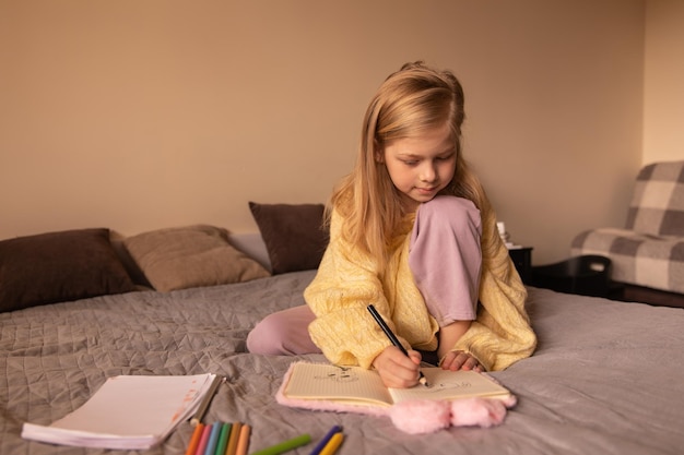 Free photo full view of cute girl sitting at room