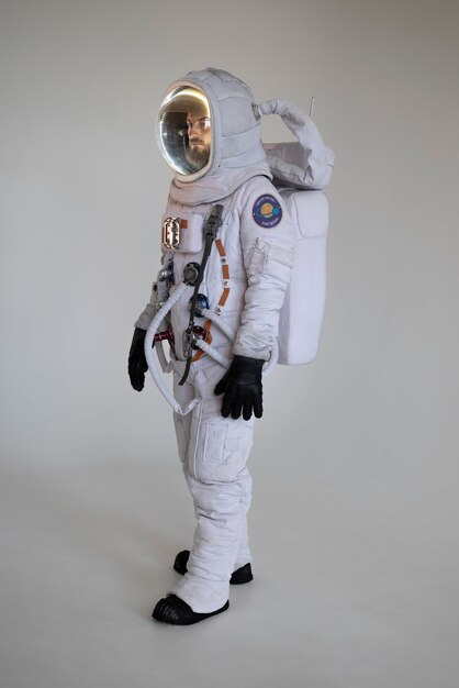 Fully equipped male astronaut in spacesuit