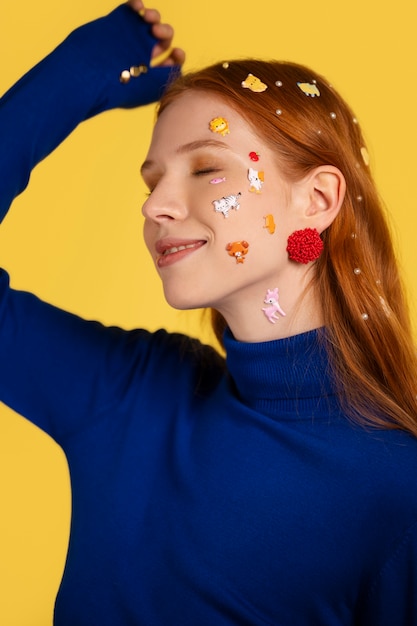 Free photo fun portrait with glued decorations on face