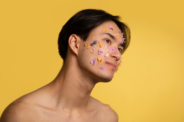 Fun portrait with glued decorations on face