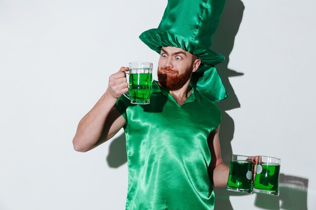 Funny bearded man in green costume