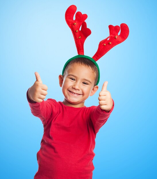 Funny child with christmas decoration