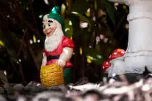 Free photo funny garden gnome outside