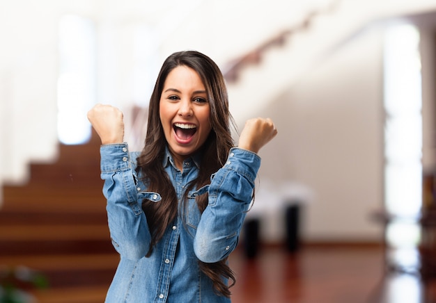 Funny girl celebrating a victory