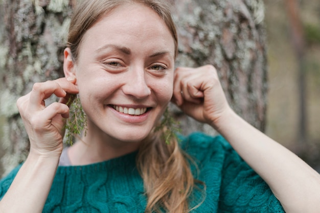 Funny girl touching her ears