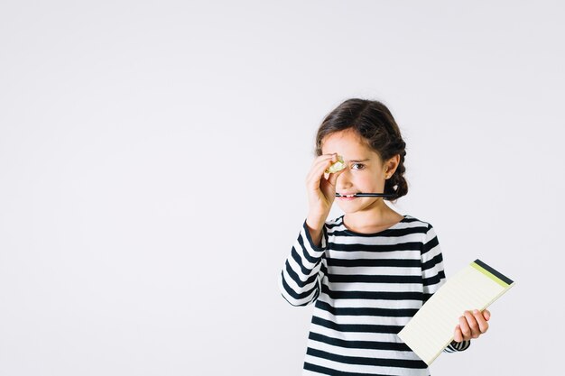 Funny girl with paper ball