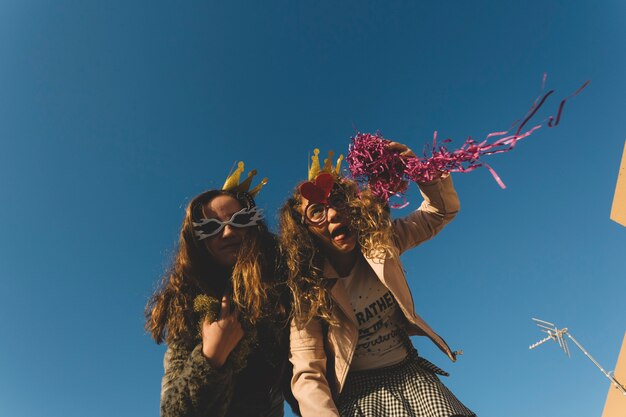 Funny girls with tinsel