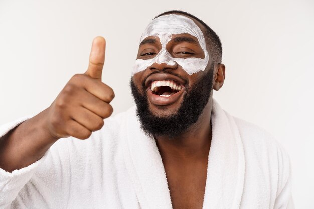 Funny laughing man with mask leads healthy lifestyle rejoicing at morning procedures positive emotio