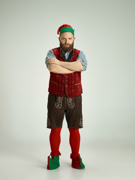 Free photo funny man in elf costume