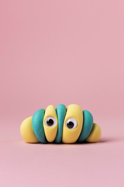 Free photo funny play dough shapes