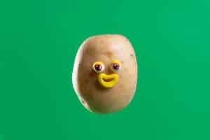 Free photo funny potato with cute sticker