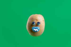 Free photo funny potato with face sticker