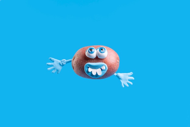 Free photo funny potato with face sticker