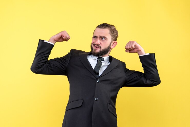 Free Photo funny young guy showing his musculars
