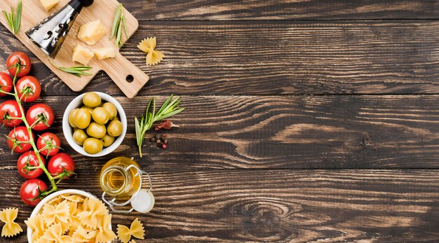 Fusilli with olives and vegetables and copy-space