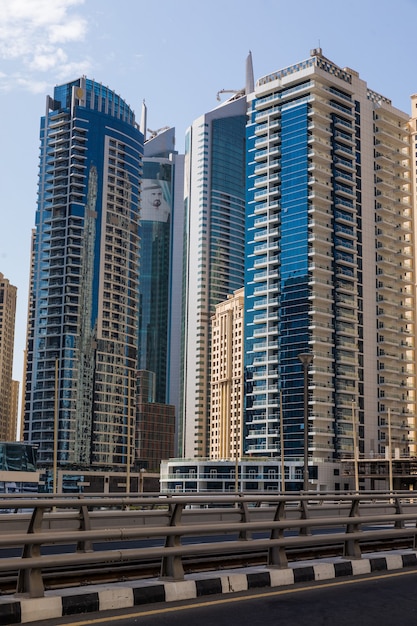 Futuristic city landscape of skyscrapers in sunny day.