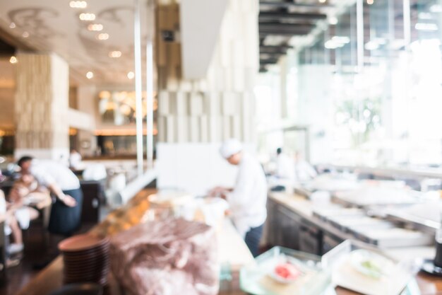 Fuzzy restaurant with a chef working