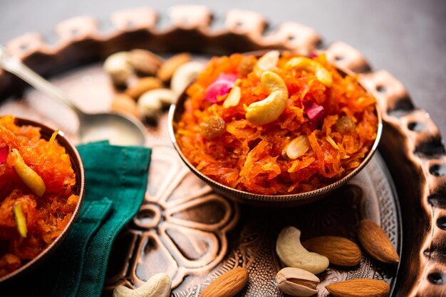 Gajar halwa, also known as gajorer halua, gajrela, gajar pak, and carrot halwa is a carrot-based sweet dessert pudding from the indian subcontinent Free Photo