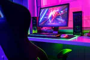 Free photo gamer chair with multicolored neon lights