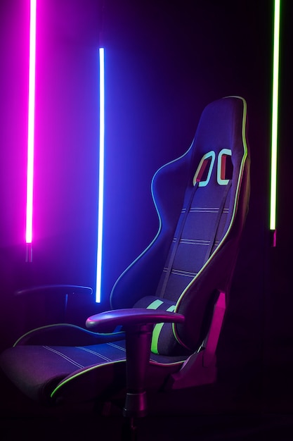 Free photo gamer chair with multicolored neon lights