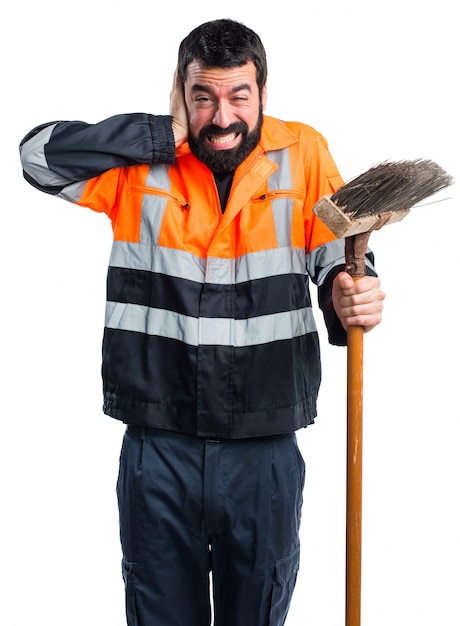 Free photo garbage man covering his ears