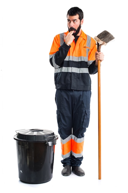 Garbage man doing vomiting gesture