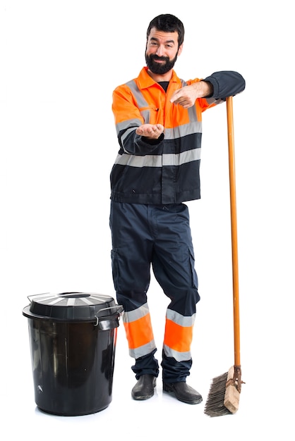 Free photo garbage man holding something