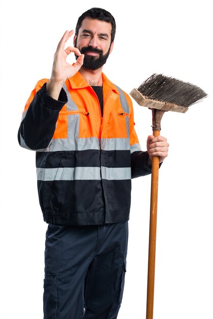 Garbage man making OK sign